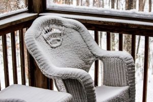 chair covered in snow